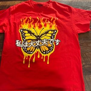 Red t-shirt with butterfly and flames on it